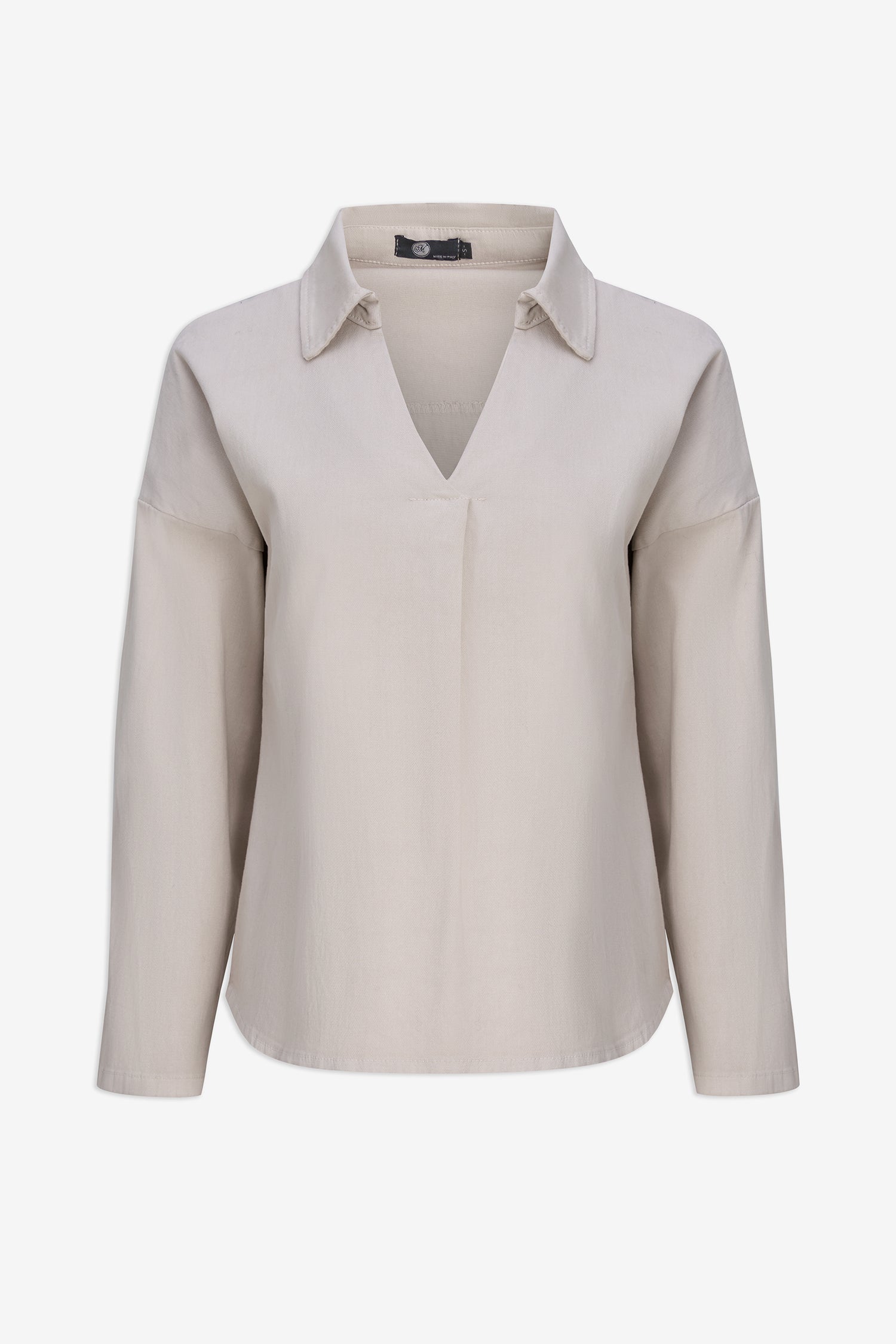 Beige blouse on a white background