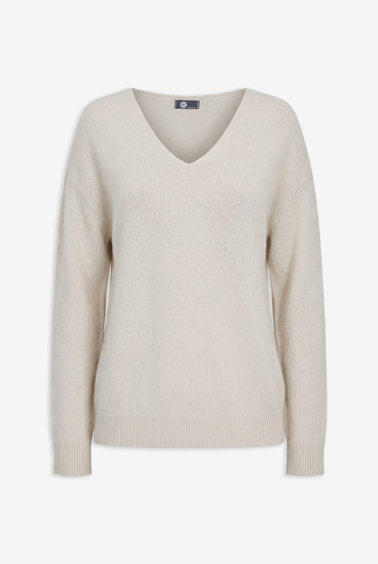 Beige sweater on a white background