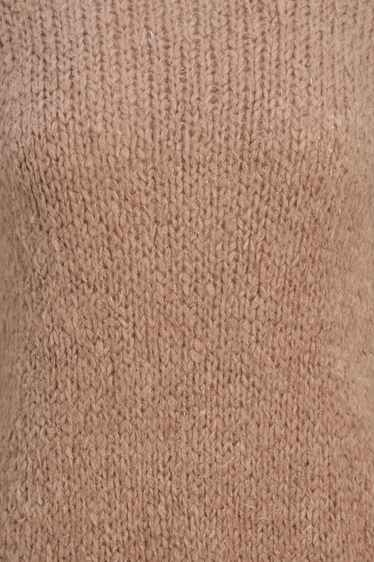 Close-up of a textured knit fabric in a warm tan or camel color, showing the detailed ribbed pattern.