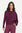 Woman wearing a purple outfit with a draped design on a white background