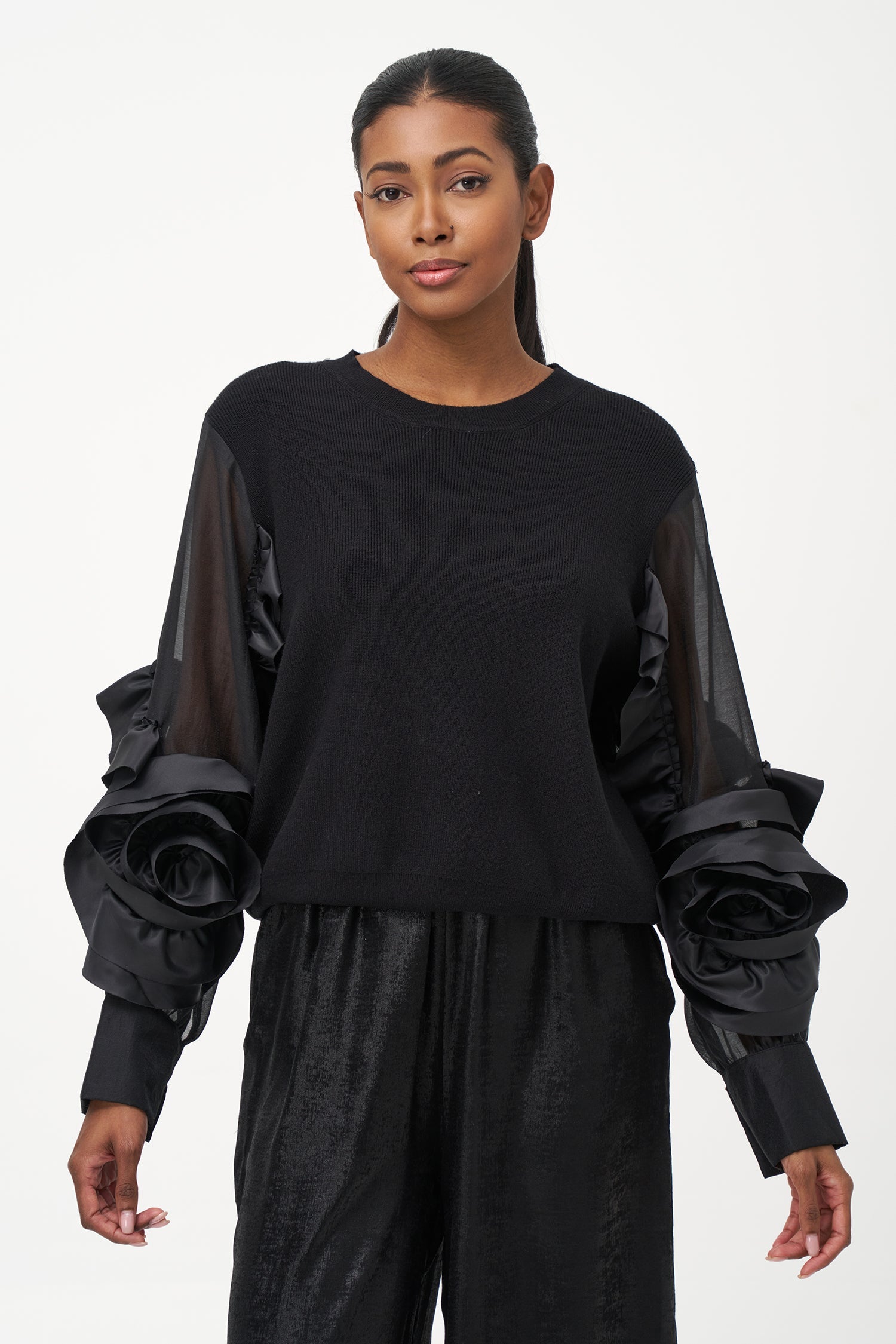 Women’s knit sweater, with sheer sleeves and floral detail